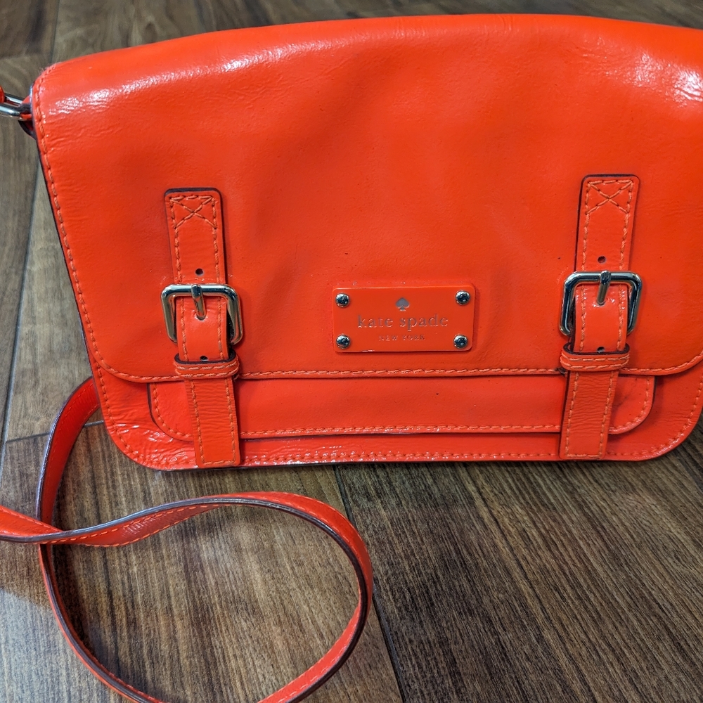 Kate Spade bright orange patent leather purse and wallet